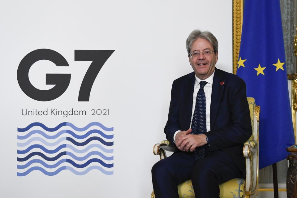 EU's Economy Commissioner Paolo Gentiloni poses for photographs as finance ministers from across the G7 nations meet at Lancaster House in London, Saturday, June 5, 2021, ahead of the G7 leaders' summit. (AP Photo/Alberto Pezzali, Pool)