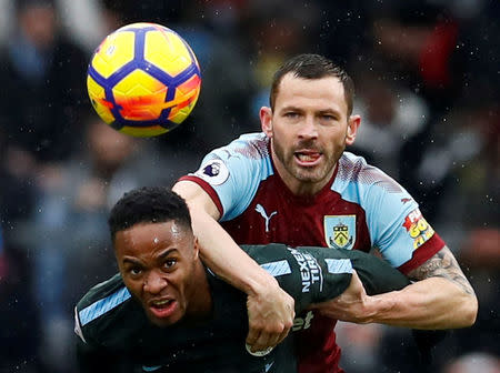 Soccer Football - Premier League - Burnley vs Manchester City - Turf Moor, Burnley, Britain - February 3, 2018 Manchester City's Raheem Sterling in action with Burnley's Phil Bardsley Action Images via Reuters/Jason Cairnduff