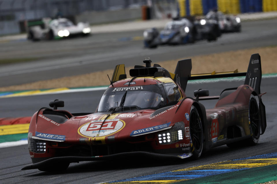 The Ferrari AF Corse team car, a Ferrari 499, driven by Italy's Alessandro Pier Guidi, Britain's James Calado and Italy's Antonio Giovinazzi during the 24-hour Le Mans endurance race in Le Mans, western France, Sunday, June 16, 2024. (AP Photo/Jeremias Gonzalez)