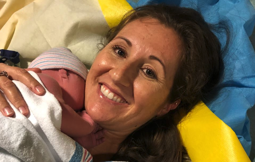 Falon Griffin smiles with her newborn baby, Gracelyn, after gaving birth in the bathroom of a Chick-fil-A. (Photo: Robert Griffin via Facebook)