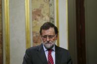 Spain's acting Prime Minister Mariano Rajoy attends a news conference after his meeting with Socialists (PSOE) leader Pedro Sanchez (not pictured) at Parliament in Madrid, Spain, February 12, 2016. REUTERS/Juan Medina