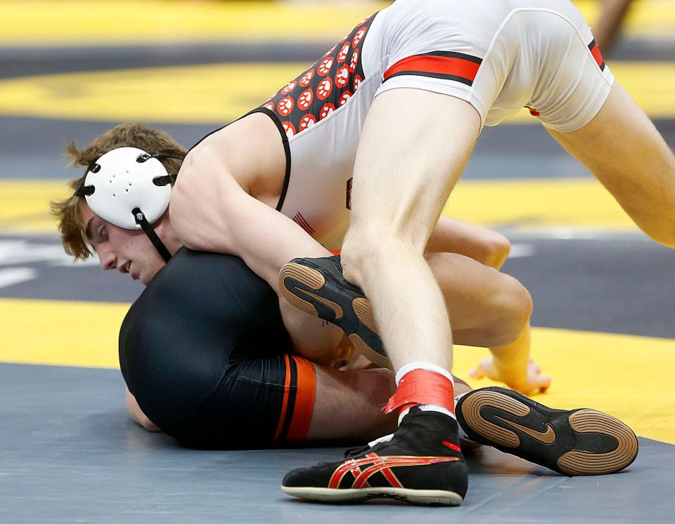 Crestview's Hayden Kuhn wrestles Ada's Clayton McClain during their 144 lbs. match at the OHSAA State Wrestling Championships Friday, March 10, 2023 at the Jerome Schottenstein Center. TOM E. PUSKAR/ASHLAND TIMES-GAZETTE