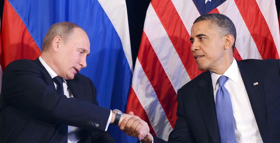 U.S. President Barack Obama (R) shakes hands with Russian President <span class="caas-xray-inline-tooltip"><span class="caas-xray-inline caas-xray-entity caas-xray-pill rapid-nonanchor-lt" data-entity-id="Vladimir_Putin" data-ylk="cid:Vladimir_Putin;pos:1;elmt:wiki;sec:pill-inline-entity;elm:pill-inline-text;itc:1;cat:OfficeHolder;" tabindex="0" aria-haspopup="dialog"><a href="https://search.yahoo.com/search?p=Vladimir%20Putin" data-i13n="cid:Vladimir_Putin;pos:1;elmt:wiki;sec:pill-inline-entity;elm:pill-inline-text;itc:1;cat:OfficeHolder;" tabindex="-1" data-ylk="slk:Vladimir Putin;cid:Vladimir_Putin;pos:1;elmt:wiki;sec:pill-inline-entity;elm:pill-inline-text;itc:1;cat:OfficeHolder;" class="link ">Vladimir Putin</a></span></span> after their bilateral meeting in Los Cabos, Mexico, on June 18, 2012, on the sidelines of the G20 summit. (Photo by Jewel Samad/AFP via Getty Images)