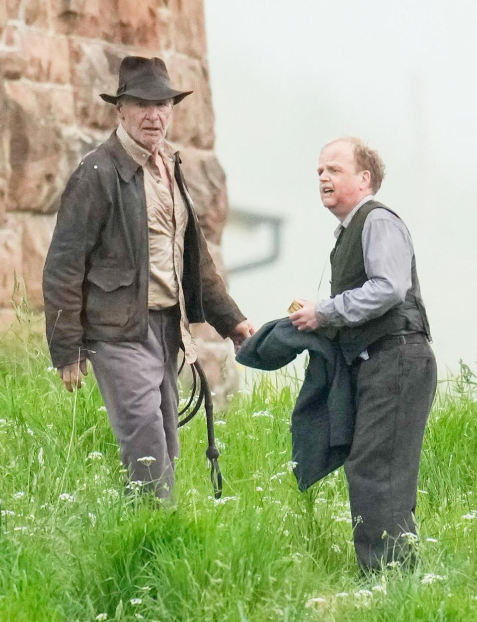 <p>Harrison Ford and Toby Jones are seen filming a new<i> Indiana Jones </i>movie in the Scottish Borders on June 11. </p>