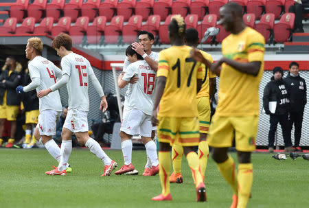 Soccer Football - International Friendly - Kirin Challenge Cup 2018 - Japan vs Mali - Stadium Maurice Dufrasne, Liege, Belgium - March 23, 2018 Japan’s Shoya Nakajima celebrates scoring their first goal REUTERS/Eric Vidal