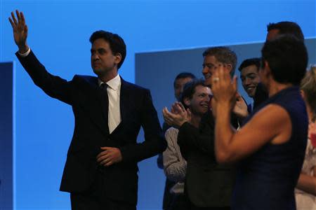 Britain's opposition Labour party leader Ed Miliband waves as he arrives to deliver his speech at the annual Labour party conference in Brighton, southern England September 24, 2013. REUTERS/Stefan Wermuth