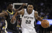 San Antonio Spurs' Rudy Gay (23) drives the ball against Golden State Warriors' Draymond Green during the first half of an NBA basketball game Wednesday, Feb. 6, 2019, in Oakland, Calif. (AP Photo/Ben Margot)