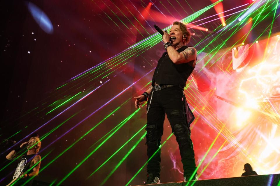 Axl Rose of Guns N' Roses performs onstage.