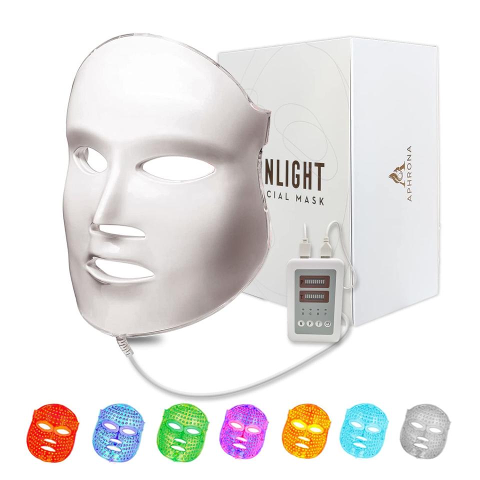 white led face mask next to product box