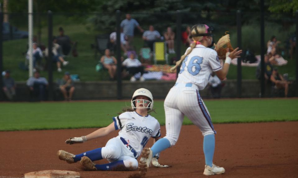 Eastern’s Jaylin McGregor is safe at third against Ballard’s Lillian Koch in the 7th Region Championship.May 23, 2023