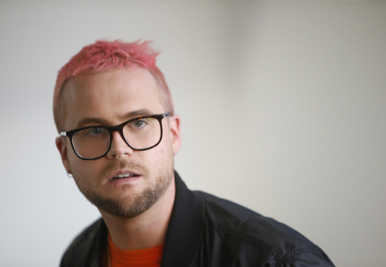 Whistleblower Christopher Wylie, a former employee at Cambridge Analytica, and his pink hair. (Photo: AP/Alastair Grant)