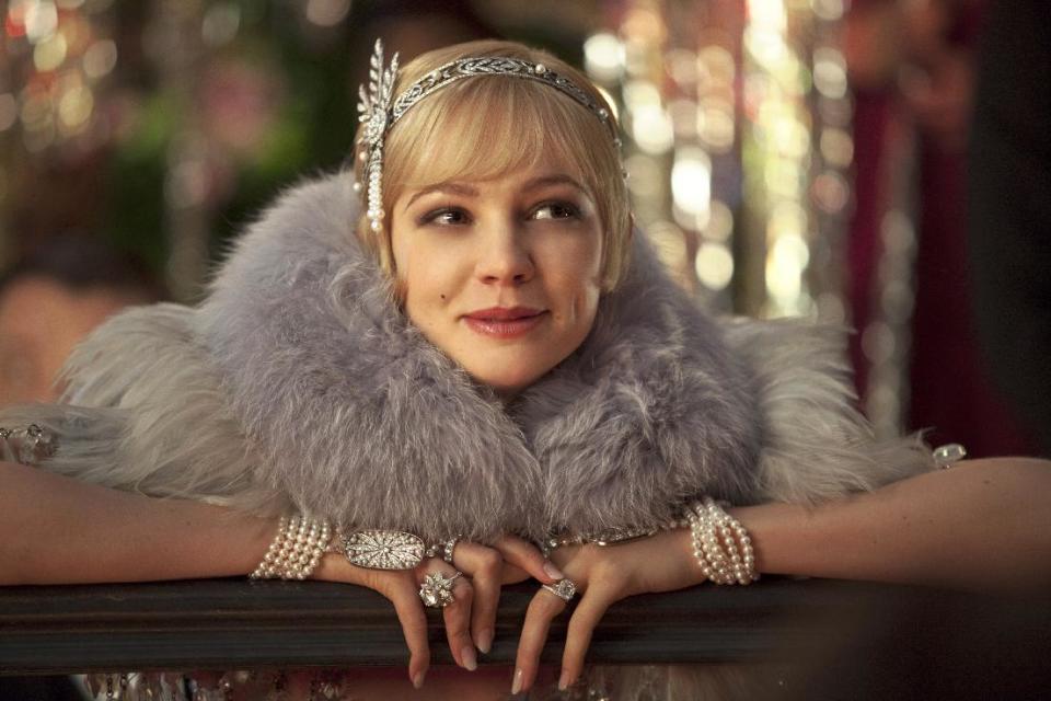 This film publicity image released by Warner Bros. Pictures shows Carey Mulligan as Daisy Buchanan in a scene from "The Great Gatsby." (AP Photo/Warner Bros. Pictures, Matt Hart)