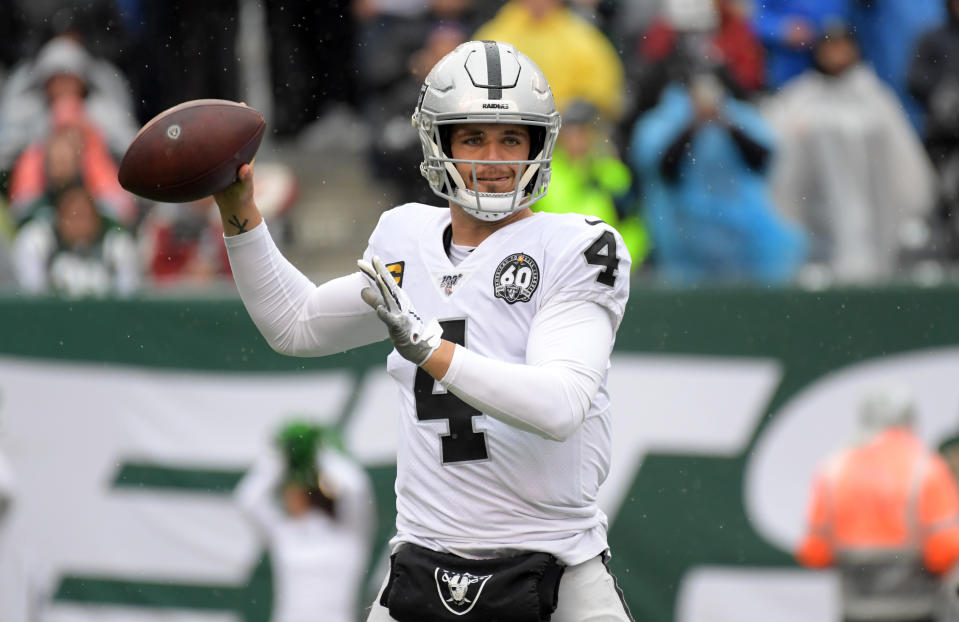 Nov 24, 2019; East Rutherford, NJ, USA; Oakland Raiders quarterback Derek Carr (4) throws the ball in first quarter against the New York Jets at MetLife Stadium. The Jets defeated the Raiders 34-3.  Mandatory Credit: Kirby Lee-USA TODAY Sports