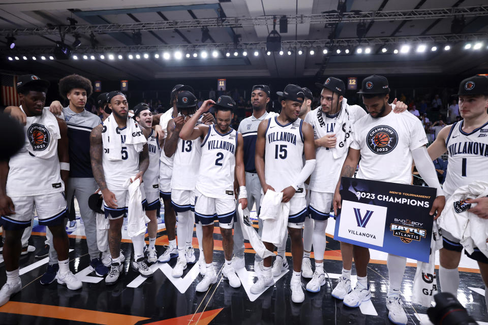 Villanova celebrate after their NCAA college basketball championship win against Memphis in the Battle 4 Atlantis at Paradise Island, Bahamas, Friday, Nov. 24, 2023. (Tim Aylen/Bahamas Visual Services via AP)