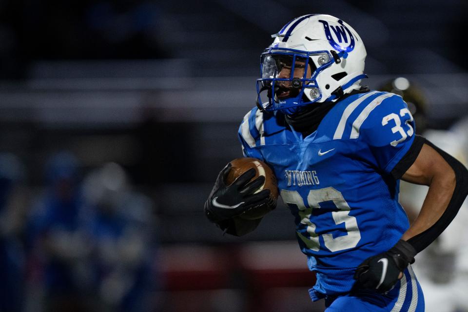 Wyoming running back C.J. Hester (33) scores a touchdown in the third quarter of the OHSAA DIV regional final Saturday.