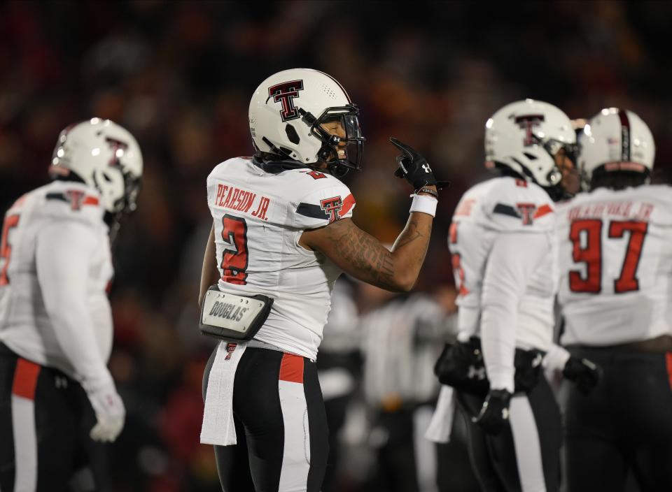 Texas Tech defensive back Reggie Pearson Jr., reacts after making a defensive play against Iowa State in the first quarter during a NCAA football game on Saturday, Nov. 19, 2022, at Jack Trice Stadium in Ames.