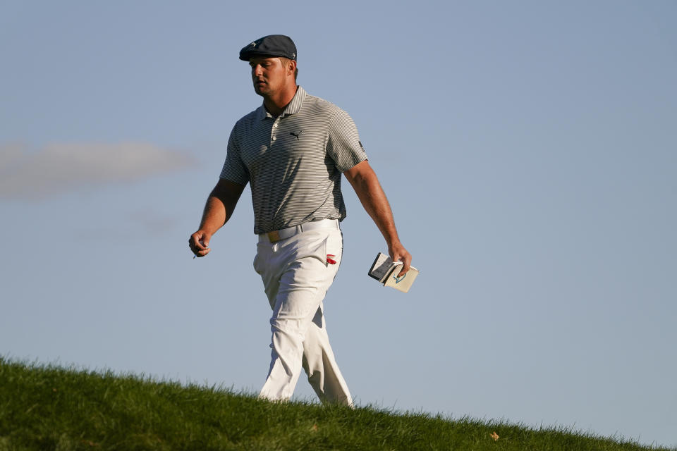 Bryson DeChambeau, of the United States, walks up to the 17th tee during the final round of the US Open Golf Championship, Sunday, Sept. 20, 2020, in Mamaroneck, N.Y. (AP Photo/John Minchillo)