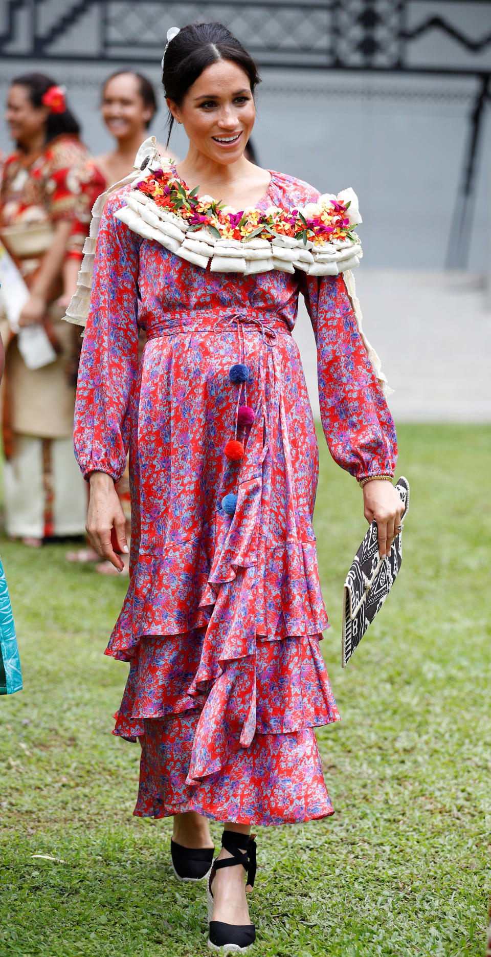 She may be a member of the Windsor household but the Duchess of Sussex proved she can still have fun with fashion in a £1,155 pom-pom dress by New York label Figue. Seeking inspiration from sister-in-law Kate, she finished the look with a pair of Kensington Palace-approved Castañer espadrilles. <em>[Photo: Getty]</em>