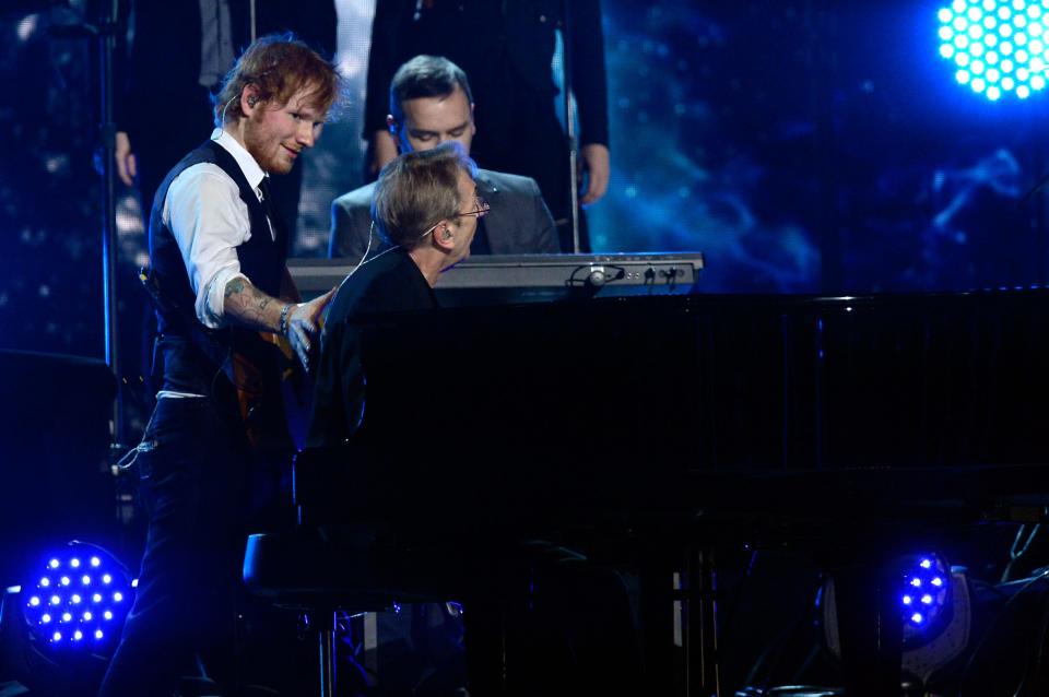 Ed Sheeran and keyboardist Richard Tandy perform "Mr. Blue Sky" during the 57th Annual Grammy Awards at the at the Staples Center on Feb. 8, 2015, in Los Angeles.