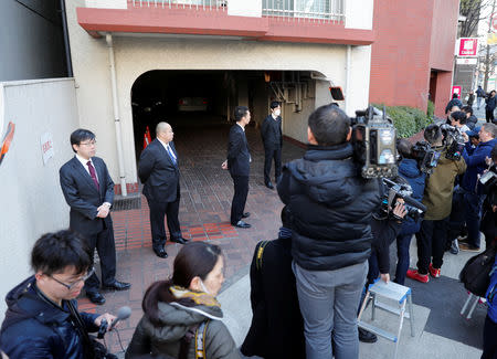 Journalists are seen in front of the residence of former Nissan Motor Chairman Carlos Ghosn in Tokyo, Japan, April 4, 2019. REUTERS/Kim Kyung-hoon