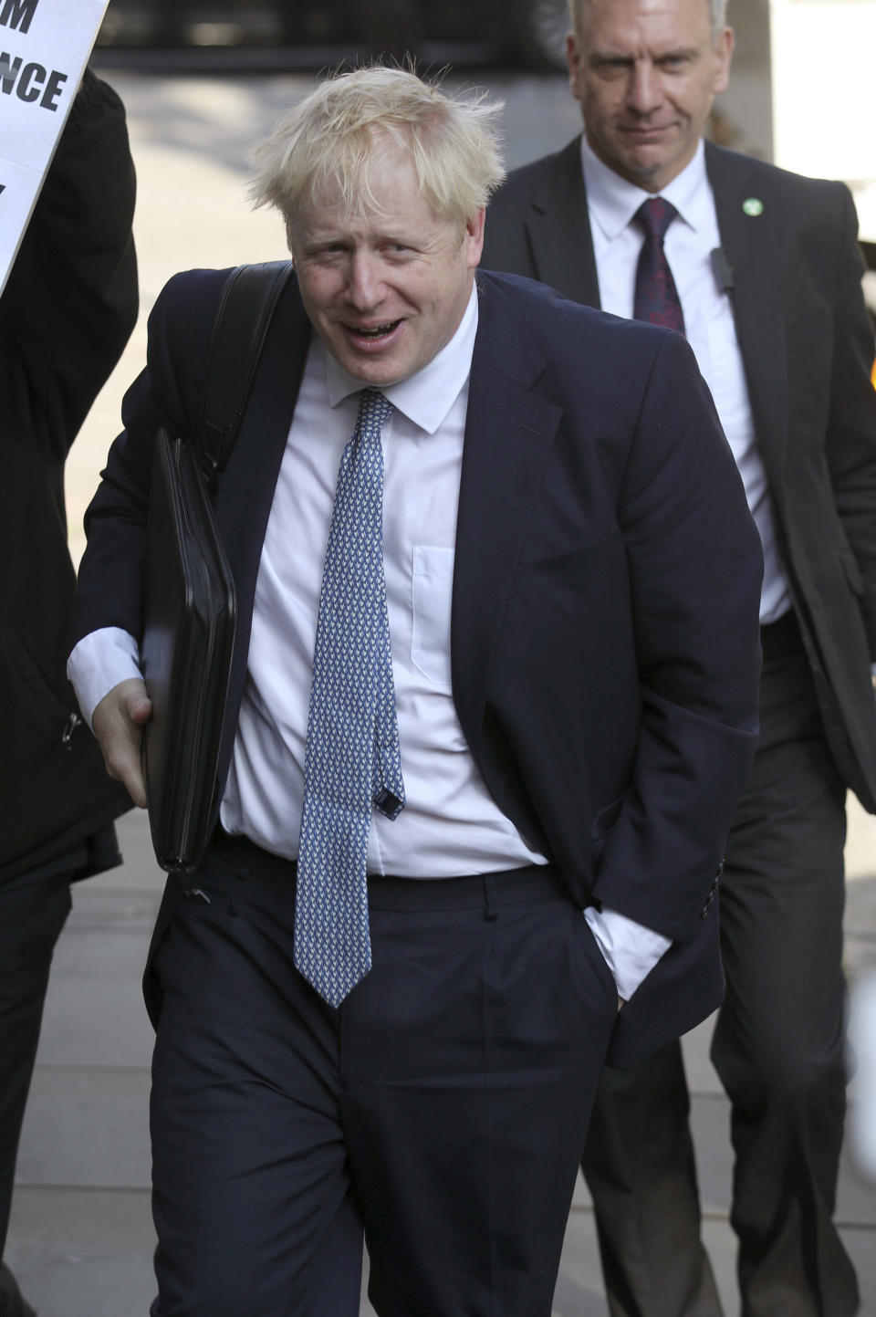 CORRECTING DATE Conservative party leadership contender Boris Johnson arrives at his office in central London, Tuesday July 23, 2019. Britain’s governing Conservative Party is set to reveal the name of the country’s next prime minister later Tuesday, with Brexit champion Boris Johnson widely considered to be favourite to get the job against fellow contender Jeremy Hunt. (Yui Mok/PA via AP)