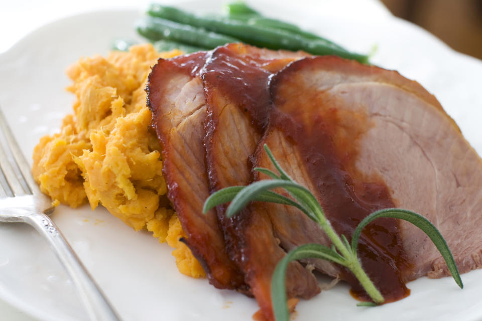 In this image taken on Dec. 3, 2012, peppadew glazed ham is shown served on a plate in Concord, N.H. (AP Photo/Matthew Mead)