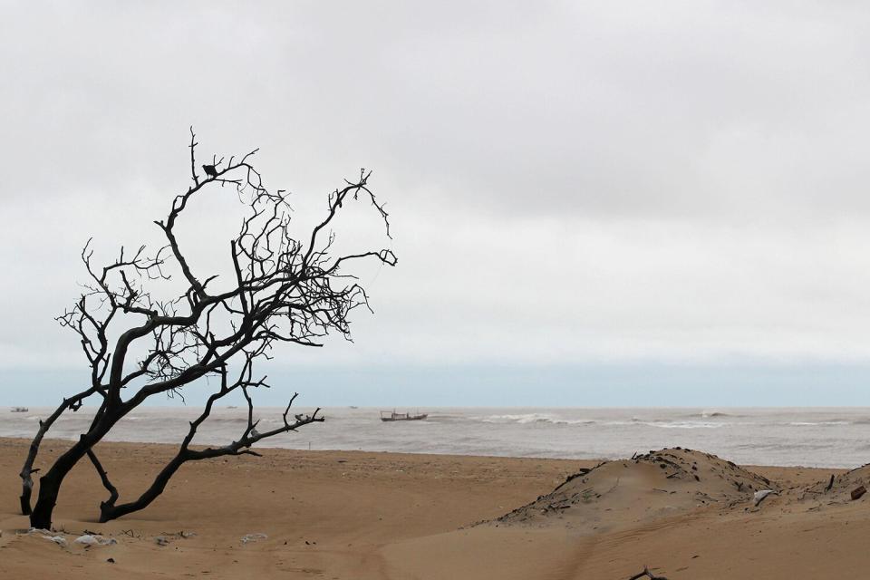 A boat is seen near Atafona beach in Atafona, about 225 miles (360 kilometers) north of Rio de Janeiro