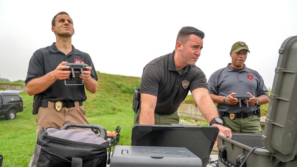 Trooper Travis Drappi, Detective James Hudson and Trooper Damien Maddox operate the state police's drone command station at Fort Adams. Drones will provide aerial monitoring at the Newport Jazz Festival, as they did for the folk festival last weekend.