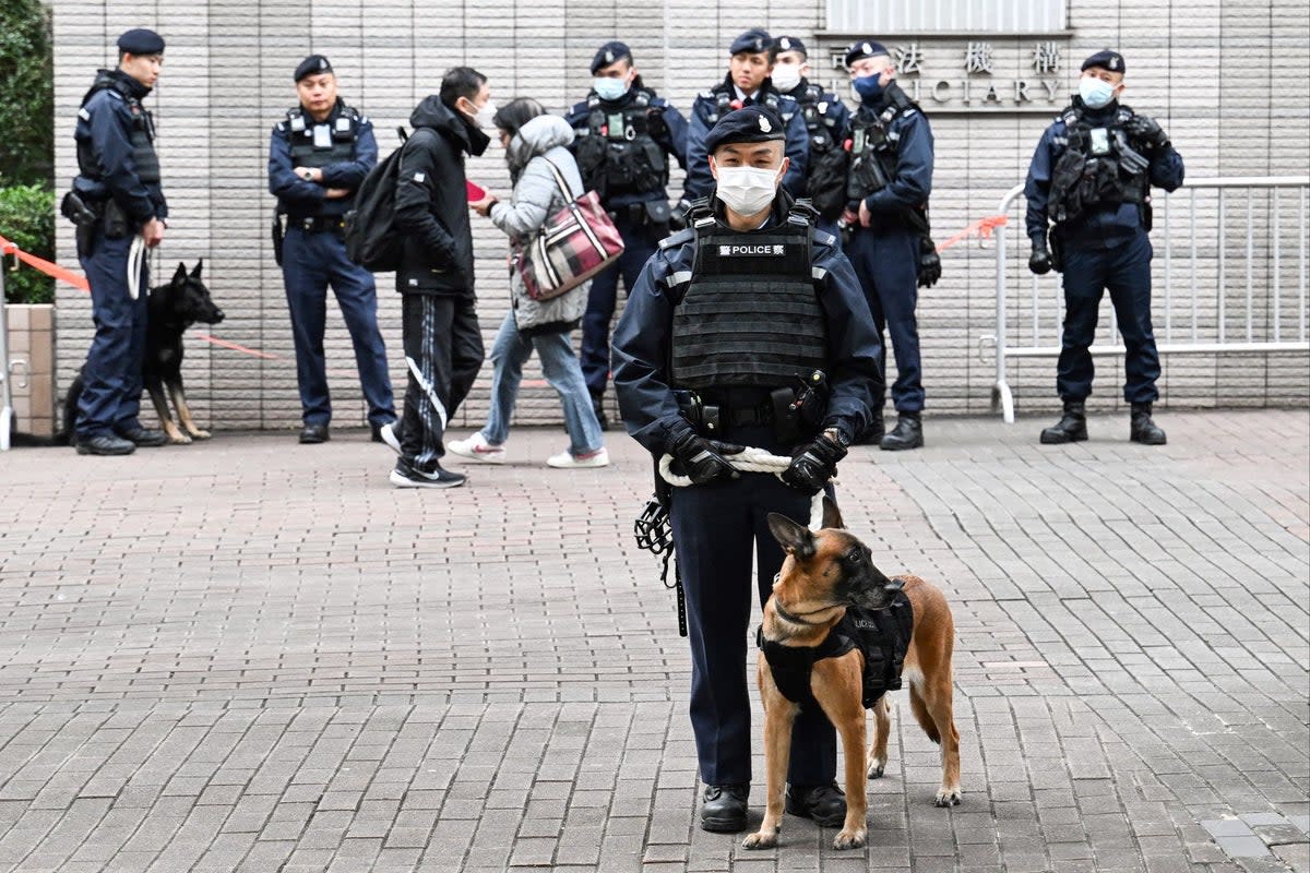 Policemen guarding the West Kowloon court in Kong Kong (AFP via Getty Images)