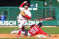 Ian Desmond #20 of the Washington Nationals slides into second to break up a double play as Daniel Descalso #33 of the St Louis Cardinals throws in the fourth inning during Game One of the National League Division Series at Busch Stadium on October 7, 2012 in St Louis, Missouri. (Photo by Dilip Vishwanat/Getty Images)