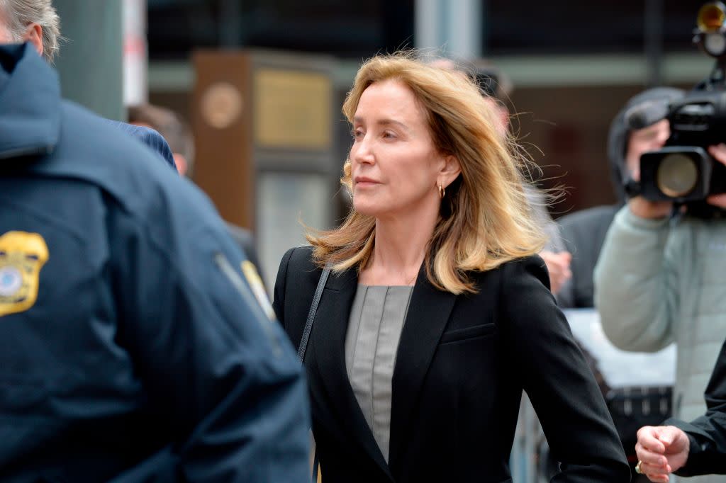 Felicity Huffman arrives for court in the college admissions scandal on May 13 in Boston. (Photo: Joseph Prezioso/AFP/Getty Images) 