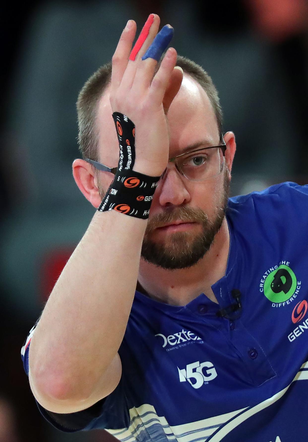 E.J. Tackett watches his ball down lane 28 as he competes against Marshall Kent during the PBA Tournament of Champions at AMF Riviera Lanes on Sunday.