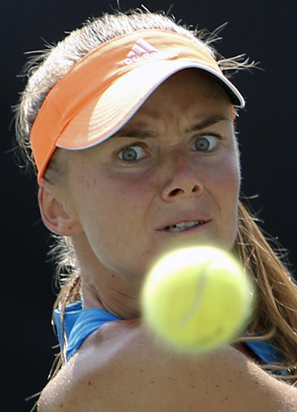 Daniela Hantuchova, of Slovakia, returns to Teliana Pereira, of Brazil, during a match at the Family Circle Cup tennis tournament in Charleston, S.C., Thursday, April 3, 2014. (AP Photo/Mic Smith)