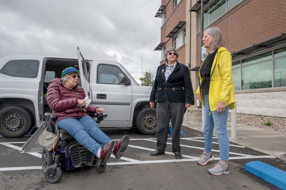 Pueblo Americans with Disabilities Act Committee members Kristen Castor, left, Sharon Campbell, center, and Heather Norton discuss the handicap accessibility at Pueblo Community Health Center's new East Side Clinic at 1301 E. Seventh St. on Tuesday May 24, 2022.