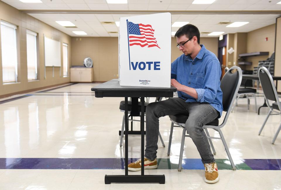 Matthew Elmer votes in the state-wide primary election on Tuesday, June 7, 2022, at Peace Lutheran Church in Sioux Falls.