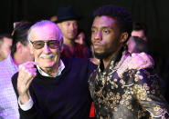 FILE - In this Jan. 29, 2018 file photo, comic book legend Stan Lee, left, creator of the "Black Panther" superhero, poses with Chadwick Boseman, star of the new "Black Panther" film, at the premiere at The Dolby Theatre on in Los Angeles. Boseman, who played Black icons Jackie Robinson and James Brown before finding fame as the regal Black Panther in the Marvel cinematic universe, has died of cancer. His representative says Boseman died Friday, Aug. 28, 2020 in Los Angeles after a four-year battle with colon cancer. He was 43. (Photo by Chris Pizzello/Invision/AP, File)