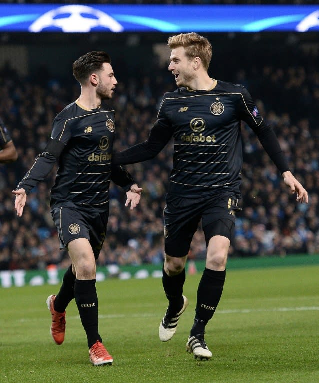 Patrick Roberts (left) celebrates his goal with Celtic team-mate Stuart Armstrong