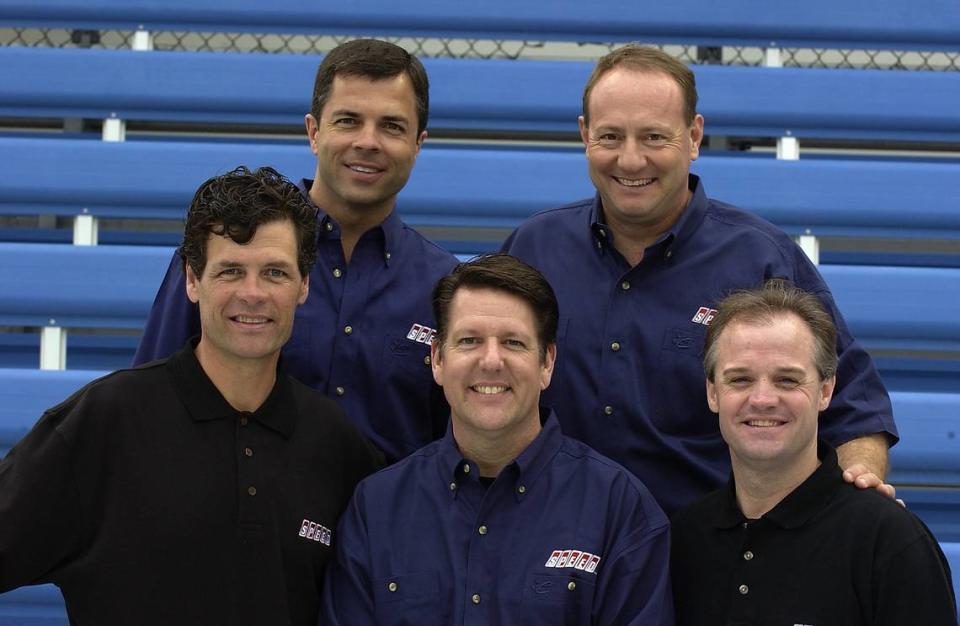 Former Cup driver Michael Waltrip (bottom left) has covered NASCAR on television since 1996. In 2004, he worked with the Inside Nextel Cup crew to cover races on the Speed Channel (FS1).