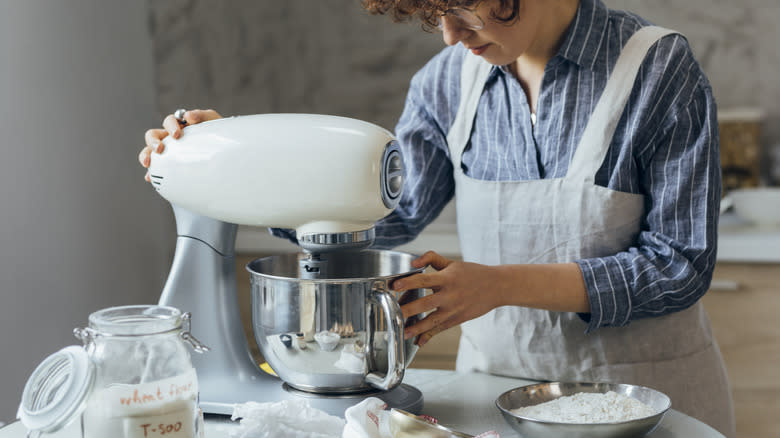 Person using stand mixer