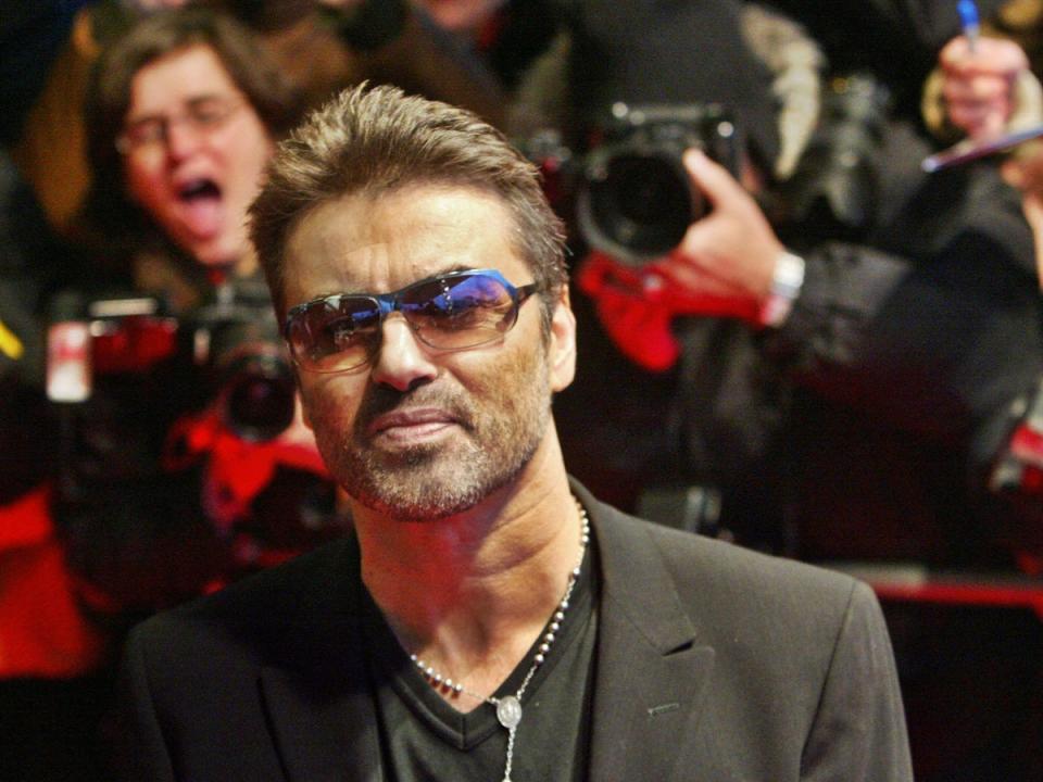 New Royal Mint coin design shows a likeness of George Michael with his trademark sunglasses (DDP/AFP via Getty Images)