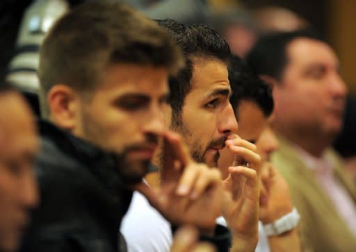 Barcelona's forward Cesc Fabregas attends a news conference in Barcelona. Barcelona's coach Pep Guardiola announced he is leaving the club at the end of the season, ending a four-year reign over one of the greatest eras in club football