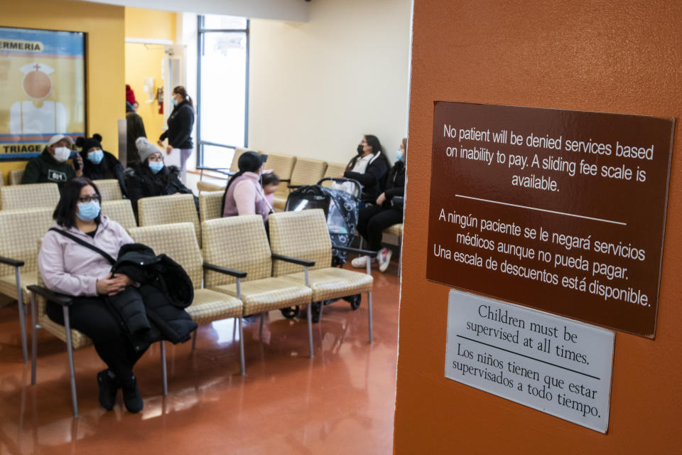 People wait for treatment at the Plaza Del Sol Family Health Center in the Queens borough in New York, Thursday, Jan. 11, 2024. Plaza del Sol is one of two dozen sites run by Urban Health Plan Inc., which is one of nearly 1,400 federally designated community health centers. (AP Photo/Eduardo Munoz Alvarez)