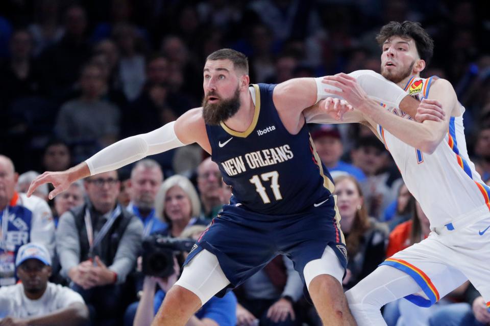 New Orleans Pelicans center Jonas Valanciunas (17) fights for position with Oklahoma City Thunder forward Chet Holmgren (7) during an NBA basketball game between the Oklahoma City Thunder and the New Orleans Pelicans at Paycom Center in Oklahoma City, Wednesday, Nov. 1, 2023. The Thunder lost 110-106.