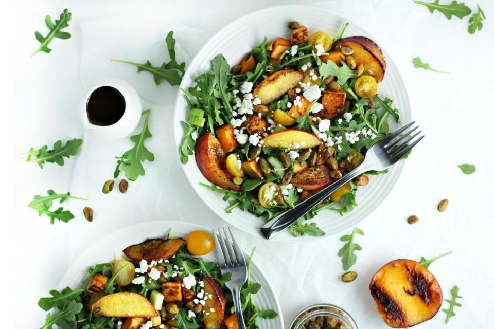 A salad served warm or cold. Recipe: Grilled Peach and Sweet Potato Salad With Honey Balsamic Vinaigrette 