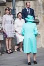 <p>Kate shows off her picture-perfect curtsy to greet the monarch.</p>