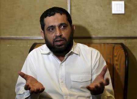 Sajid Usmani, project manager for Bahria Icon Tower, gestures during an interview with Reuters at his office in Karachi, Pakistan February 9, 2016. REUTERS/Akhtar Soomro