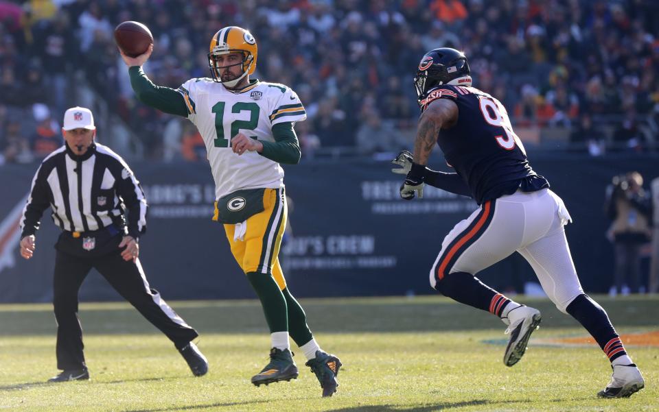 Green Bay Packers quarterback Aaron Rodgers throws a pass at Soldier Field in Chicago.