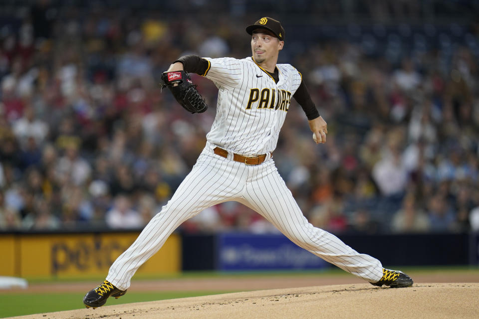 San Diego Padres starting pitcher Blake Snell works against a Philadelphia Phillies batter during the first inning of a baseball game Friday, Aug. 20, 2021, in San Diego. (AP Photo/Gregory Bull)