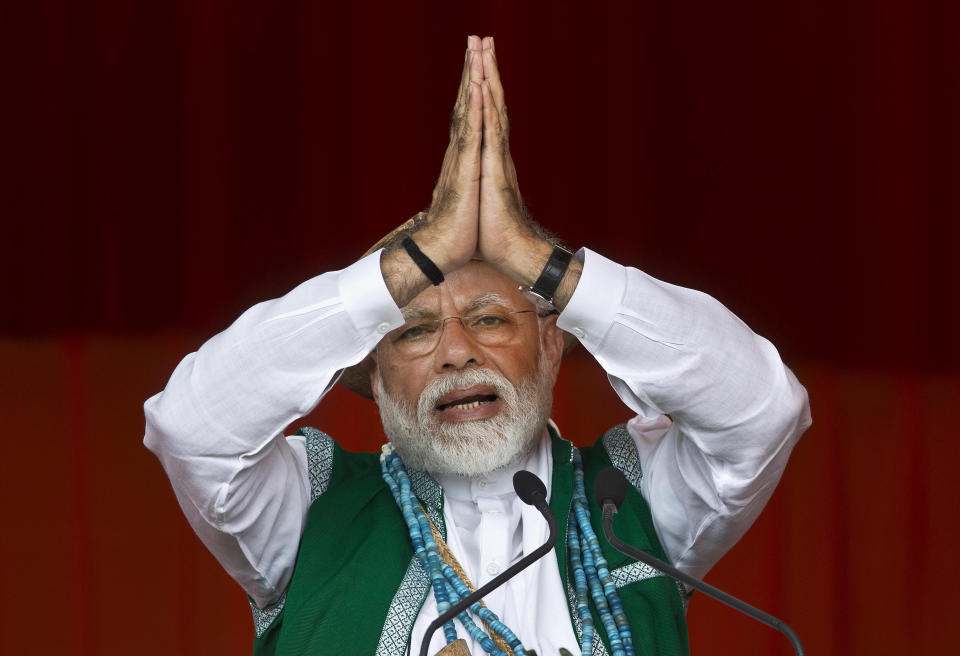 FILE- In this March 30, 2019 file photo, Indian Prime Minister Narendra Modi gestures as he speaks during an election campaign rally of his Bharatiya Janata Party (BJP) in Along, Arunachal Pradesh, India. Modi on Sunday apologized to the country’s public for imposing the ongoing world's largest lockdown for three weeks, calling it harsh but “needed to win” the battle against coronavirus pandemic. (AP Photo/Anupam Nath, File)