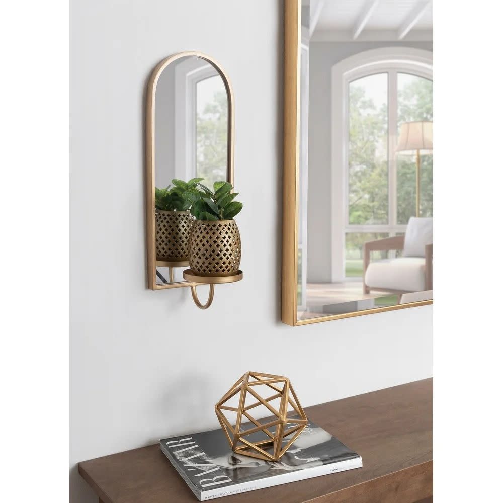 <p><a href="https://go.redirectingat.com?id=74968X1596630&url=https%3A%2F%2Fwww.overstock.com%2FHome-Garden%2FKate-and-Laurel-Ezerin-Metal-Mirror-Wall-Sconce-6x5x16%2F32281012%2Fproduct.html&sref=https%3A%2F%2Fwww.goodhousekeeping.com%2Fhome-products%2Fg43506889%2Fbest-home-products-april-2023%2F" rel="nofollow noopener" target="_blank" data-ylk="slk:Shop Now;elm:context_link;itc:0;sec:content-canvas" class="link rapid-noclick-resp">Shop Now</a></p><p>Metal Mirror Wall Sconce </p><p>$62.99</p><p>Overstock.com</p>